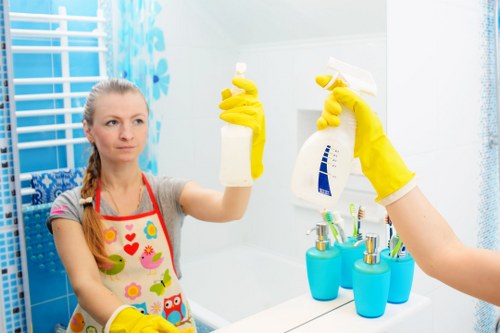 Office cleaner maintaining a professional workspace in Uxbridge