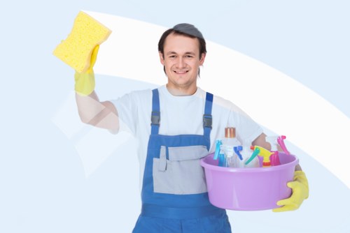 Professional cleaners in Uxbridge using PPE and following safety procedures
